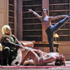 Salome (Dancer:Martin Dvorak, Herodes: Dale Albright). SALOME (Richard Strauss). Tiroler Landestheater, 2006. Photo: Rupert Larl